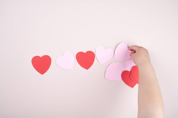 istock A child holding a heart in his hand 1318691153