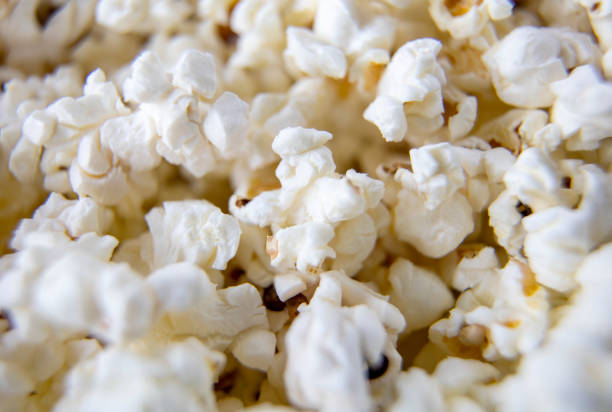 istock Heap of fresh made popcorn in machine 1318693699