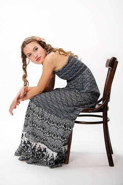 Portrait of a pretty young girl with long curly hairs stock photo