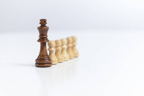 istock Business competition with chess figures strategy leadership and success concept copy space for text 1318695617