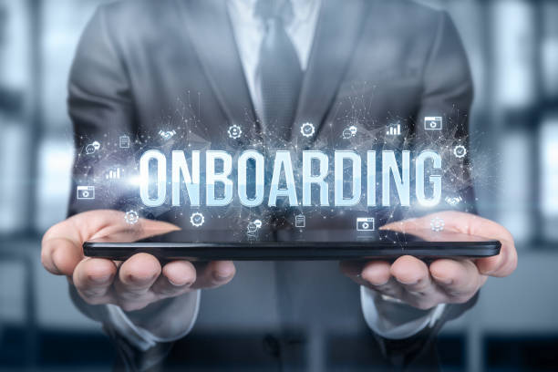 businessman shows on the tablet the word onboarding . - onboarding imagens e fotografias de stock