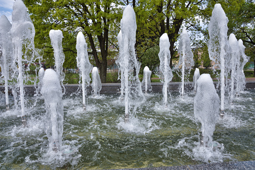 In the summer, fountains are turned on in the city.It is cool around them in hot weather.