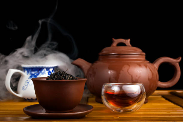 istock Clay teapot with smoked red tea Lapsang souchong 1318699982