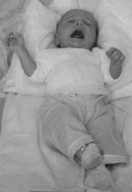 Image from the 50s, newborn baby crying from above