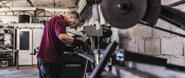 istock Metal worker cuts steel 1318707308
