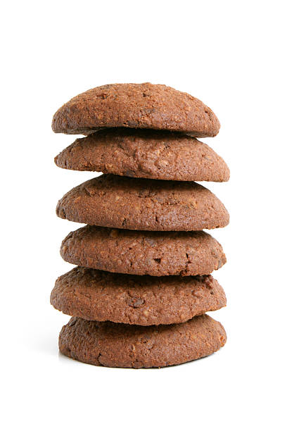 pila di biscotti di farina d'avena al cioccolato - oat oatmeal isolated stack foto e immagini stock