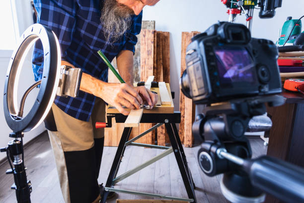 istock DIY Woodworking vlogging, drawing cutting marks on wood plank 1318711275