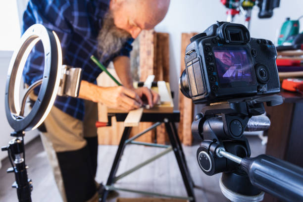 istock DIY Woodworking vlogging, drawing cutting marks on wood plank 1318711392
