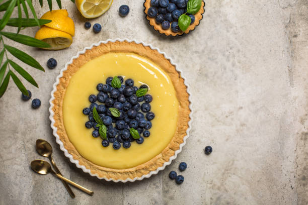 istock Homemade lemon curd and blueberry tart. Copy space. 1318714545