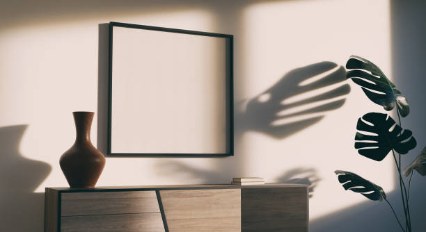 istock Mockup frame in simple retro interior. Strong shadows of the rising sun. 3D render. 1318715993