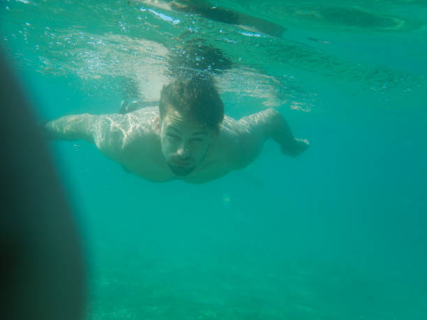 istock Exploring under the water stock photo 1318717224