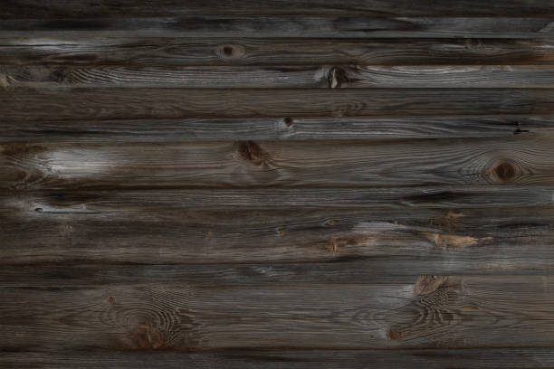 istock Wooden background from old boards with knots 1318717284