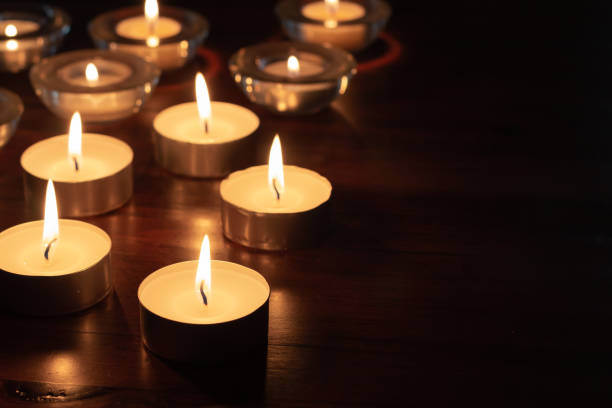 istock Candles burning in the dark with copy space 1318717908