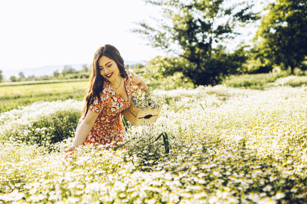 istock Beauty and Chamomile field 1318719296