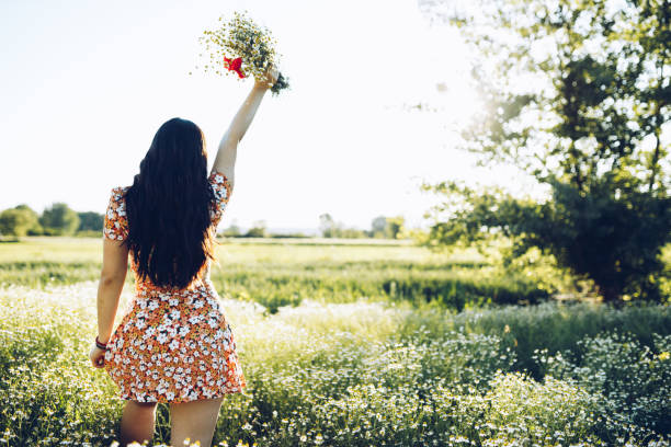 istock Beauty and Chamomile field 1318719416