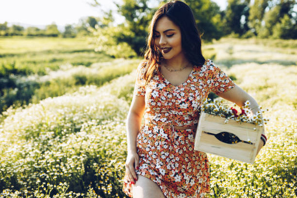 istock Beauty and Chamomile field 1318719451