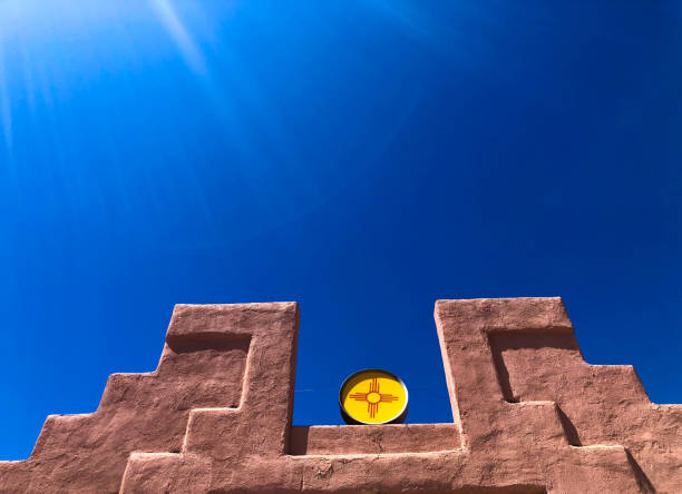 istock Costilla, NM: Adobe Building with New Mexico's Zia Sign 1318720134
