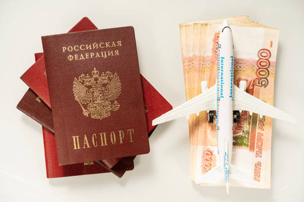 istock Preparing for the trip. Purchase of plane tickets. Documents money aviation. 1318730985
