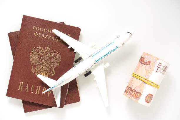 istock Preparing for the trip. Purchase of plane tickets. Documents money aviation. 1318730996