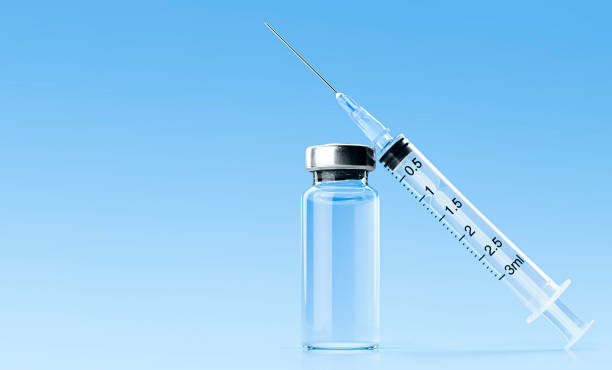 istock vaccine and syringe 1318733535