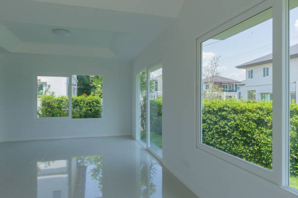 istock Empty room with glass window frame house interior on concrete wall 1318737946