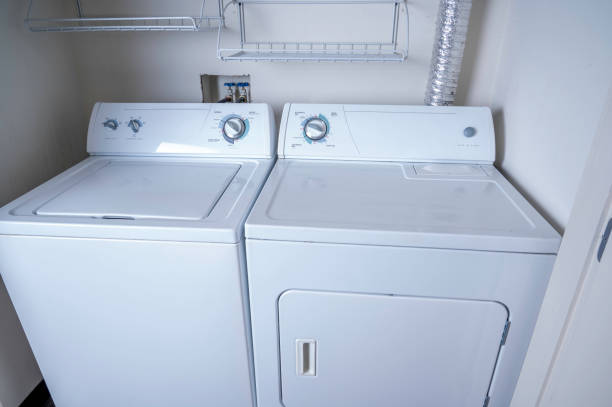 istock Washing machine and dryer in utility room 1318738362