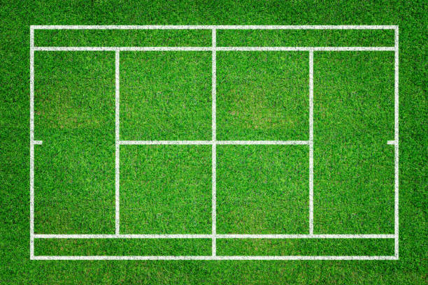 istock Grass tennis court field with white line pattern. Baseline for sport game background. 1318742494