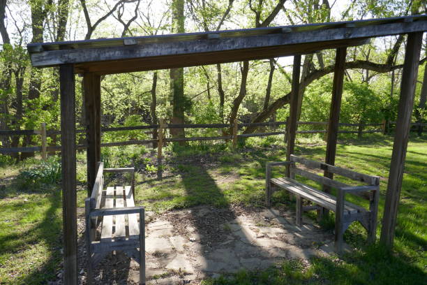 istock Outdoor covered resting area with park benches 1318748327