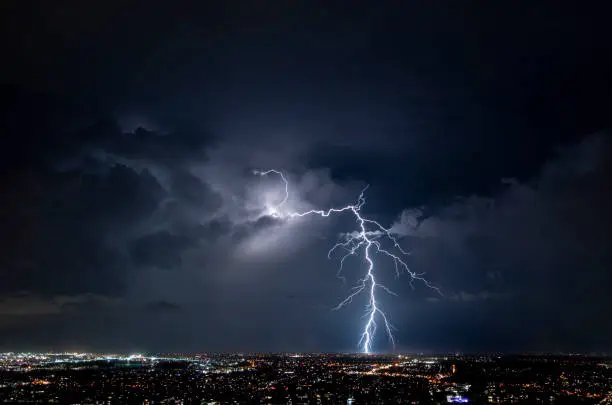 Photo of Massive Lightning Strike Over the Brisbane City Suburbs Lights