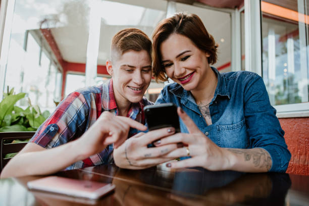 istock Young Adults lifestyle using mobile phone 1318749699