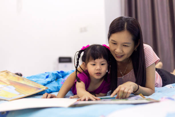 istock bedtime bonding with little girl 1318758411