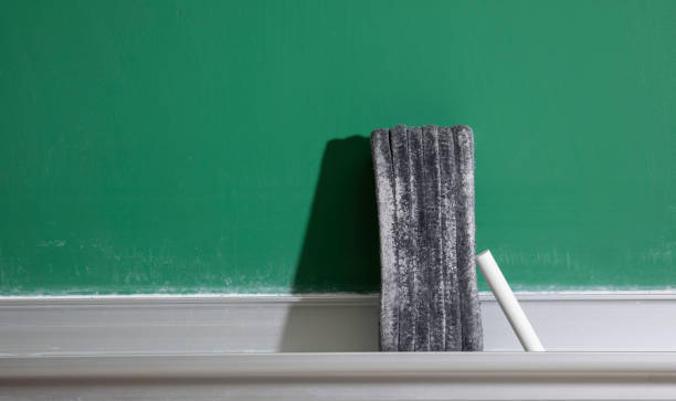 School chalk board with eraser and chalk
