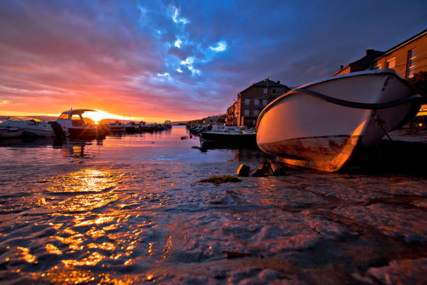 istock Town of Karlobag in Velebit colorful sunset panoramic view 1318762067