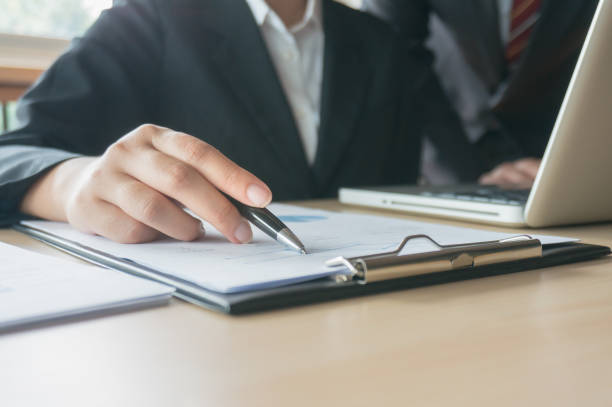 istock Team leader coach teach young workers explain on paper for business plan listen talkative coworker and discussing new project presentation Serious professional advisor consulting in office 1318773715