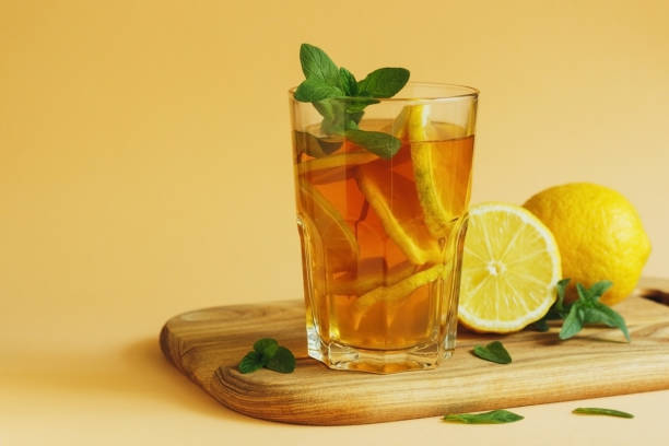 istock Iced tea with lemon slices and mint 1318774184