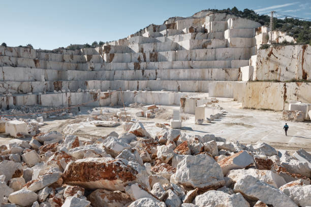 istock Ledges of abandoned marble quarry in a daytime 1318775197