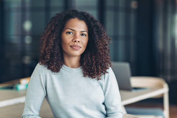istock Confident businesswoman sitting in her office 1318775679