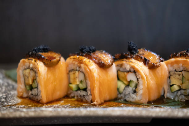 istock Close up grilled salmon rolls topped with seared Foie Gras 1318778243