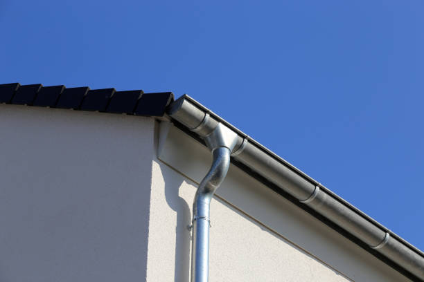 istock Roof gutter on a new tiled roof 1318779350
