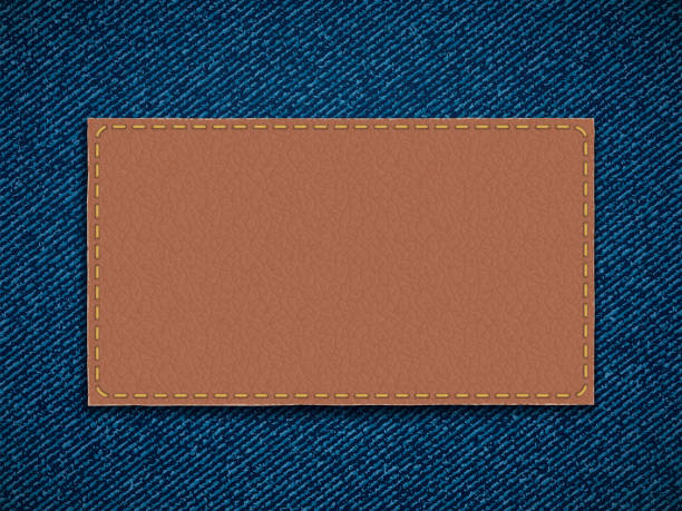 skórzana etykieta na dżinsie. pusty szablon do kopiowania miejsca. - leather textured backgrounds textile stock illustrations