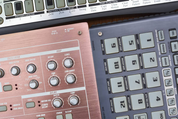 istock Top view of electronic synthesizers and sampler for creating electronic music. Studio equipment and devices for analog sound composing. 1318783349