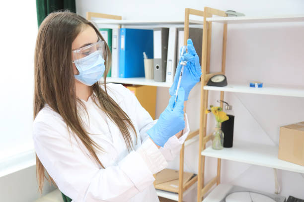 istock Young doctor preparing a vaccine 1318783570