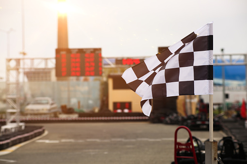 The finish line and checkered flag racing. finish the race. High quality photo