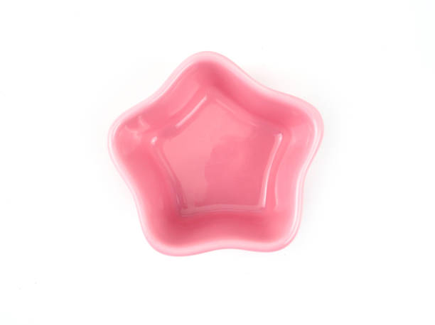 istock Top view, Empty pink star-shape ceramic plate isolated on a white background. 1318801297
