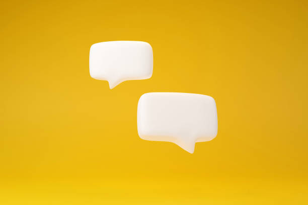 discorso di conversazione con doppia casella di testo su sfondo giallo - text balloons foto e immagini stock