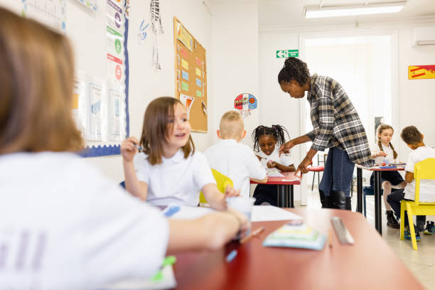istock Primary School children In Classroom 1318805043