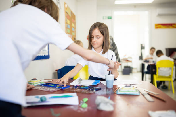 istock Primary School children In Classroom 1318805054