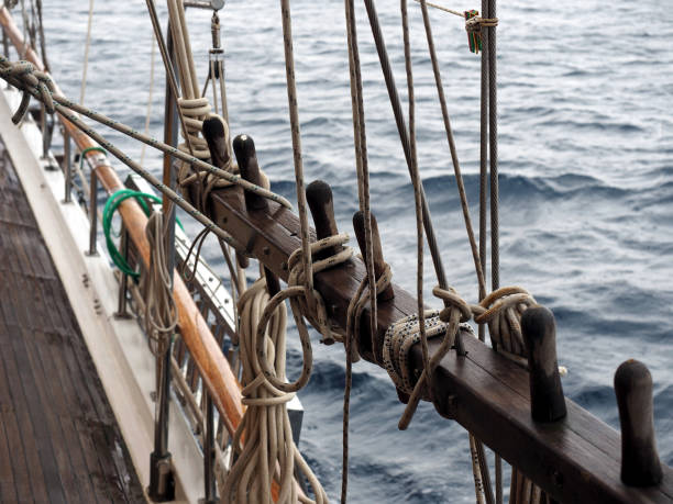 istock Wooden pulley and sailboat ropes 1318805059
