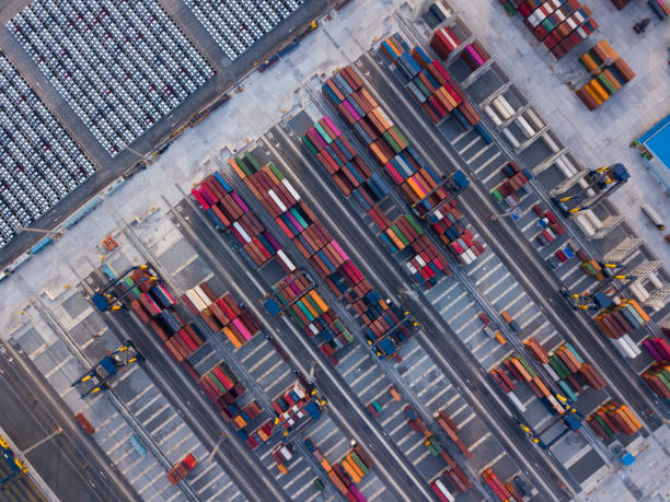 istock Aerial drone view above containers at dockyard. 1318808377