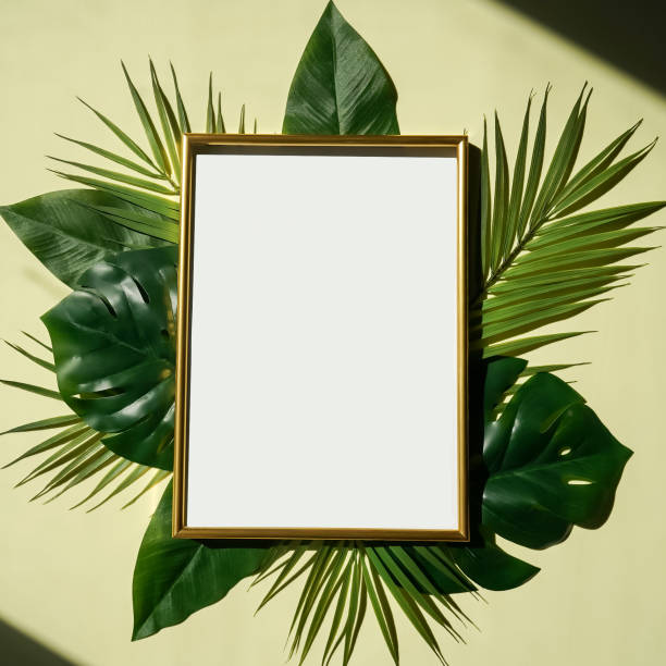 istock Green leaves with white copy space background. 1318811751